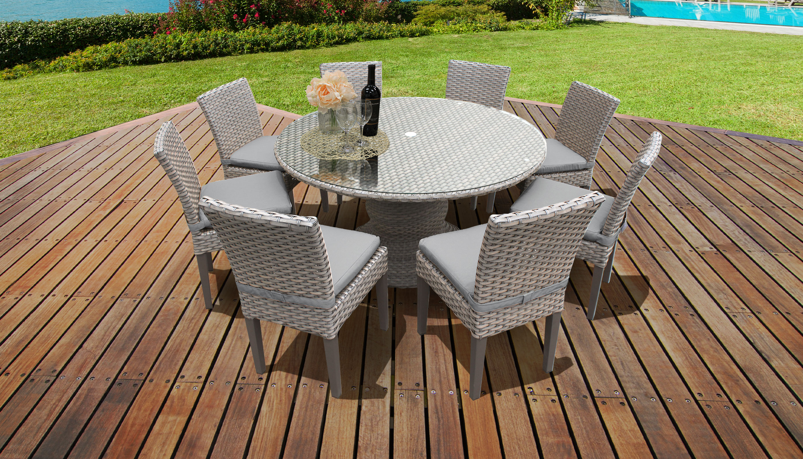 monterey 60 inch outdoor patio dining table with 8 armless chairs